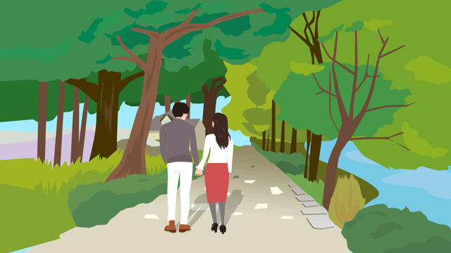 人里から離れた道を散策するふたりの恋人たち