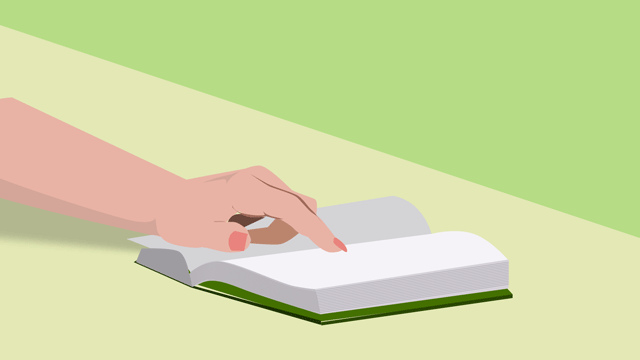 開いた本をさしている指