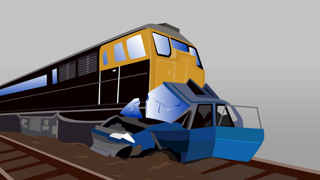 踏み切りで電車に破壊された車