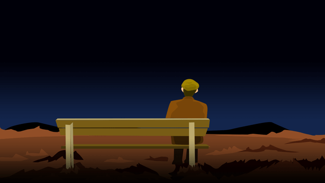 北東の広く暗い空間に顔を向けている老人