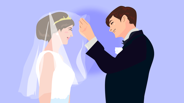 結婚式のあとで花嫁のヴェールをはずす花婿