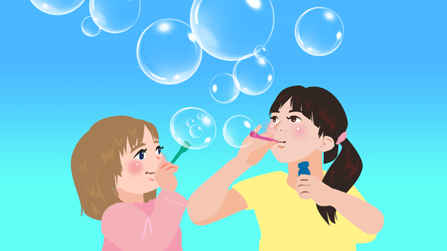 しゃぼん玉をふくらませている子どもたち
