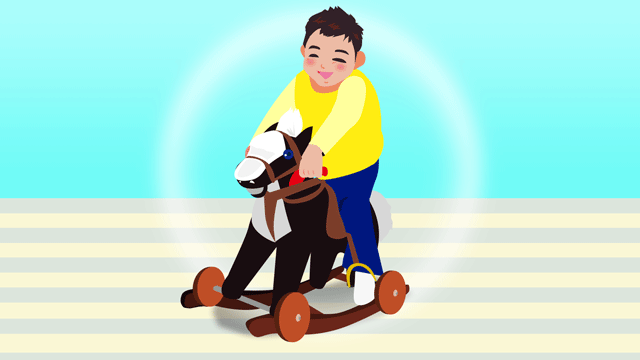 玩具の馬上にいる小太りの少年